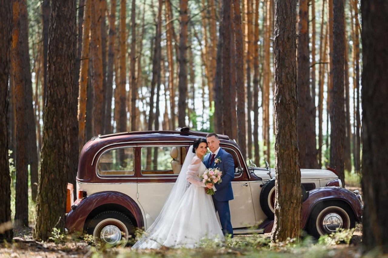 <a href="https://www.freepik.com/free-photo/side-view-married-bride-groom-wearing-festive-clothes-standing-face-face-holding-bridal-bouquet-smiling-looking-camera-while-posing-near-retro-car-forest-wedding-day_29454090.htm#query=wedding%20car&position=38&from_view=search&track=ais">Image by freepic.diller on Freepik</a>